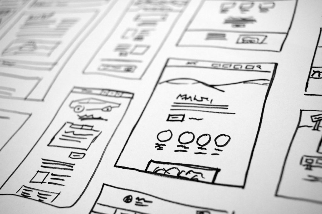 A series of black-and-white sketches for website pages